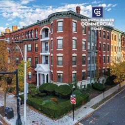 Brick exterior multifamily building on corner