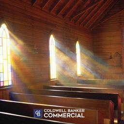 Inside a Wooden Church with Empty Pews